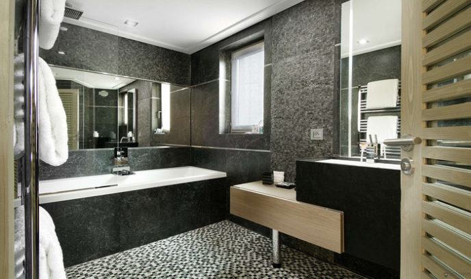 Post_chalet black pearl courchevel 1850 bathroom dark tiles bath.jpg