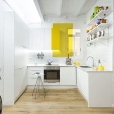 Post_fun way of adding yellow radiance to the small white kitchen.jpg