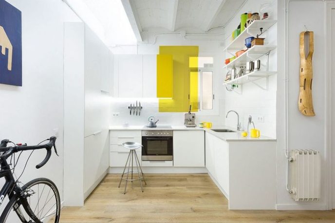 Post_fun way of adding yellow radiance to the small white kitchen.jpg