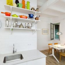 Post_kitchenware adds color to the all white kitchen.jpg