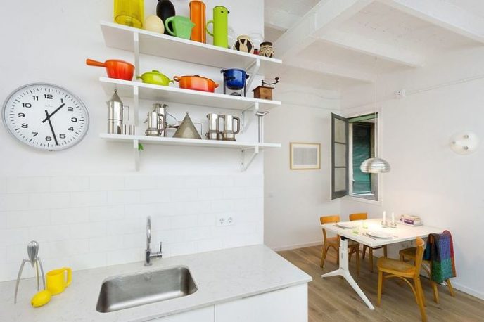 Post_kitchenware adds color to the all white kitchen.jpg