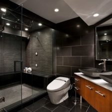 Post_shower tiles bring cool textural contrast to the gorgeous bathroom.jpg