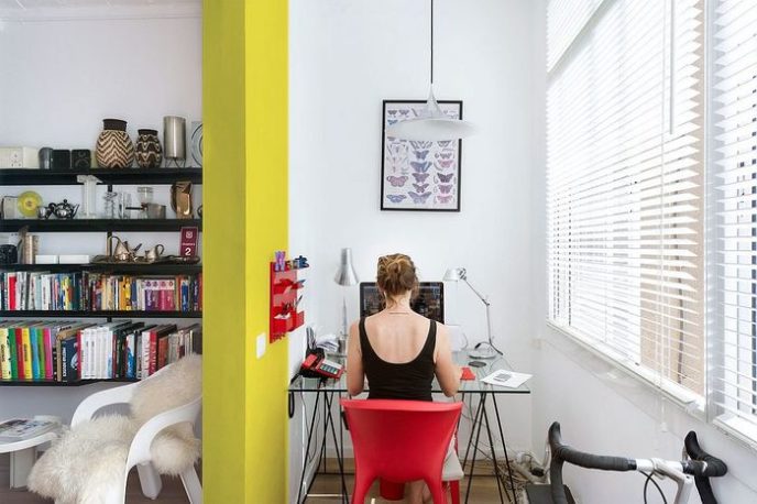 Post_small home workspace with ample natural light and glas desk.jpg