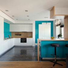 Post_apartment minimalist apartment kitchen with blue and white color scheme and marble floor and black bar stools by zeworkroom minimalist moscow apartment interior apartment.jpg