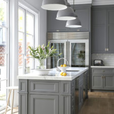 Post_classic kitchen with gray cabinetry and white granite countertop.jpg