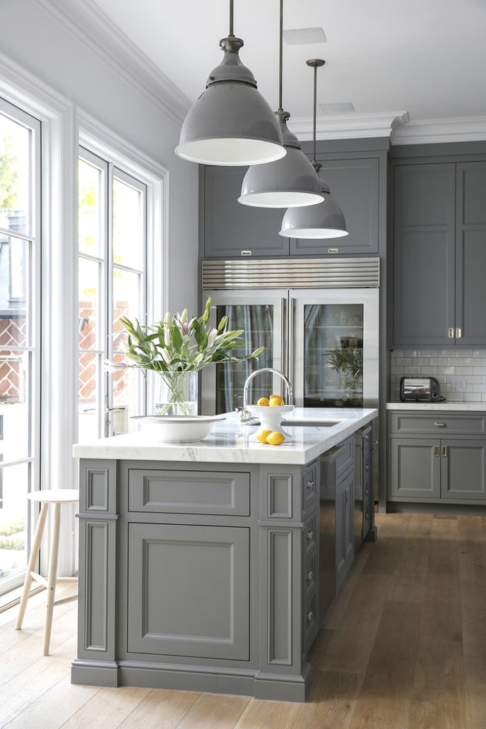 Post_classic kitchen with gray cabinetry and white granite countertop.jpg