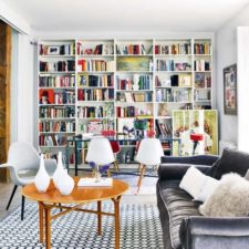 Post_stylish bookshelves for comfortable living room ideas with elegant velvet sofa and modern printed carpet.jpg