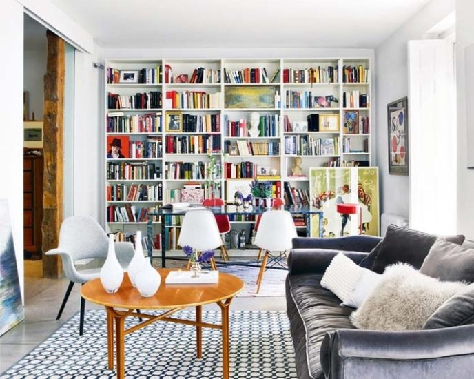 Post_stylish bookshelves for comfortable living room ideas with elegant velvet sofa and modern printed carpet.jpg