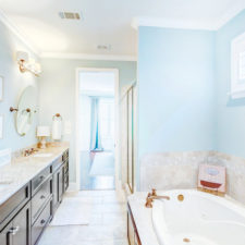 Post_traditional master bathroom with granite countertops stone backsplash and crown molding i_g is95a49aecuanw0000000000 d1n5h.jpg