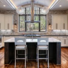 Post_transitional kitchen with absolute black granite hardwood flooring and breakfast bar i_g isdcaoj04wfv2d1000000000 gfpj6.jpg