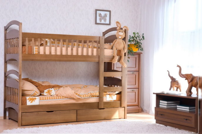 Post_chic wooden bunk bed with curved headboard and foot board on white rug plus tall cest of drawers plus elephant decor.jpg