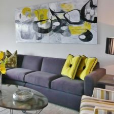 Post_modern living room with abstract art yellow accents neon yellow 1.jpg