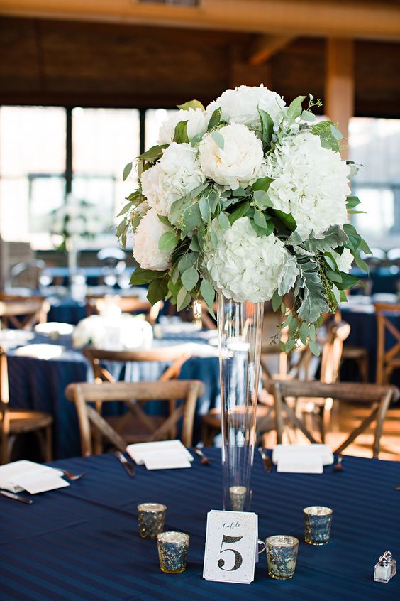 Green white centerpiece with peonies hydrangea and eucalyptus.jpg