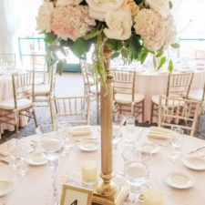 Ivory and cream tall wedding centerpiece.jpg