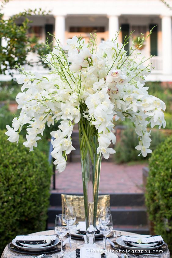 Orchid centerpiece for a great gatsby themed wedding.jpg