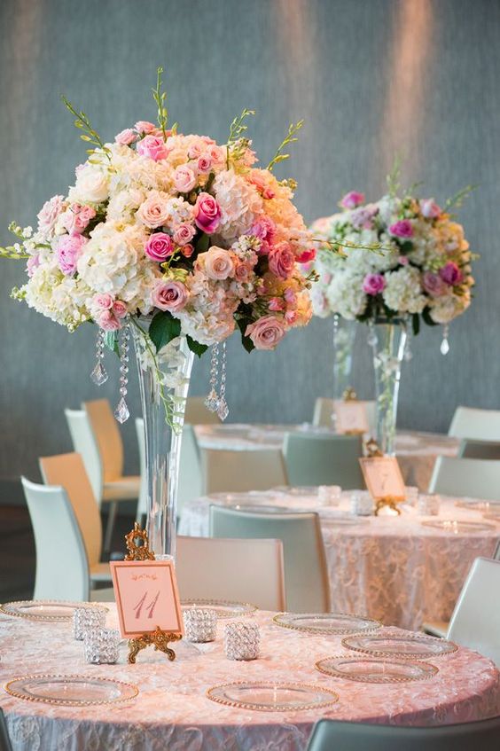 Pink roses and white hydrangea tall wedding centerpiece.jpg