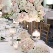 Roses hydrangeas and peonies tall wedding centerpiece.jpg