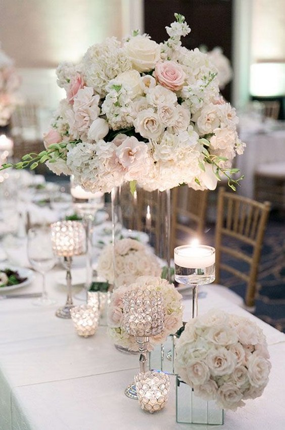 Roses hydrangeas and peonies tall wedding centerpiece.jpg