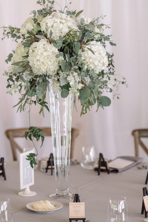 White and green tall wedding centerpieces.jpg