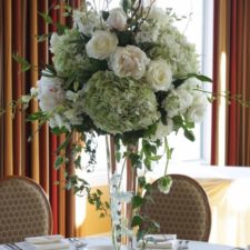 White and greenery tall wedding centerpiece.jpg