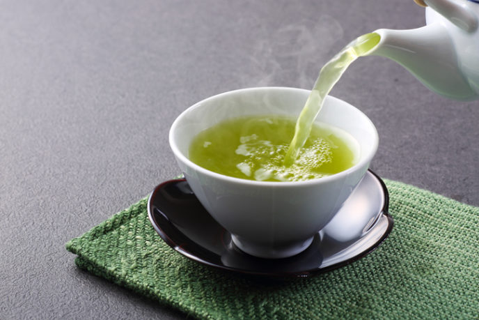 Pouring green tea