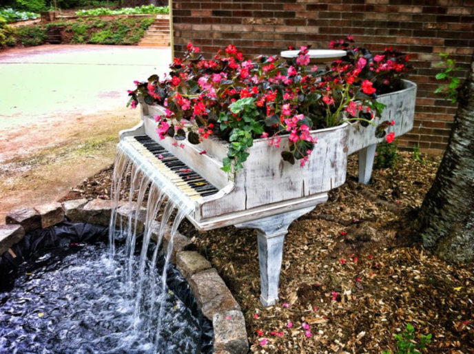 Old piano turned into outdoor water fountain.jpg