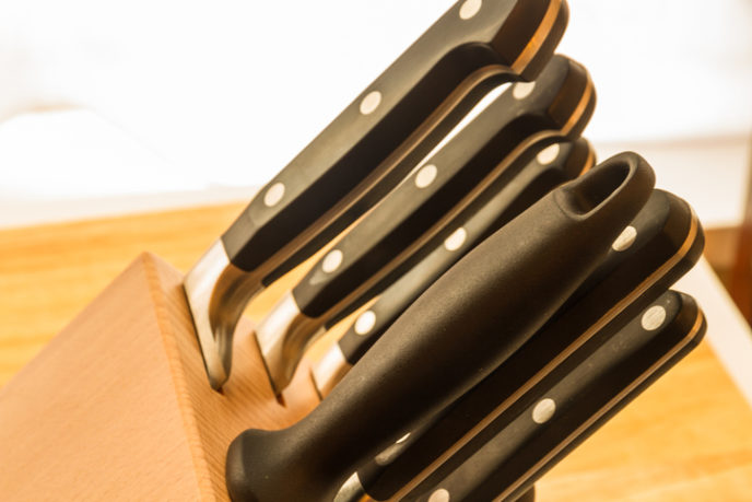 Set of five cook’s knives in block.