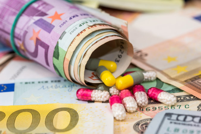 Pharmaceutical business. euro banknotes with pills.