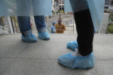 Virus Outbreak A man arrives to receive a dose of the Pfizer BioNTech COVID 19 coronavirus vaccine at a community vaccination center at the Kowloon Mosque And Islamic Centre in Hong Kong, Saturday, March 19, 2022. Hong Kong's cumulative coronavirus infections have exceeded 1 million as the city grapples with a widespread outbreak that has killed more people than the reported COVID 19 deaths in all of mainland China Hong Kong